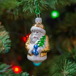 Retro Christmas ball Santa Claus with a Christmas tree - golden