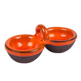 Tiny traditional double dish with orange glaze