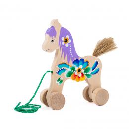 A toy horse on wheels, large - purple mane