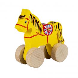 A small carved horse on wheels - yellow